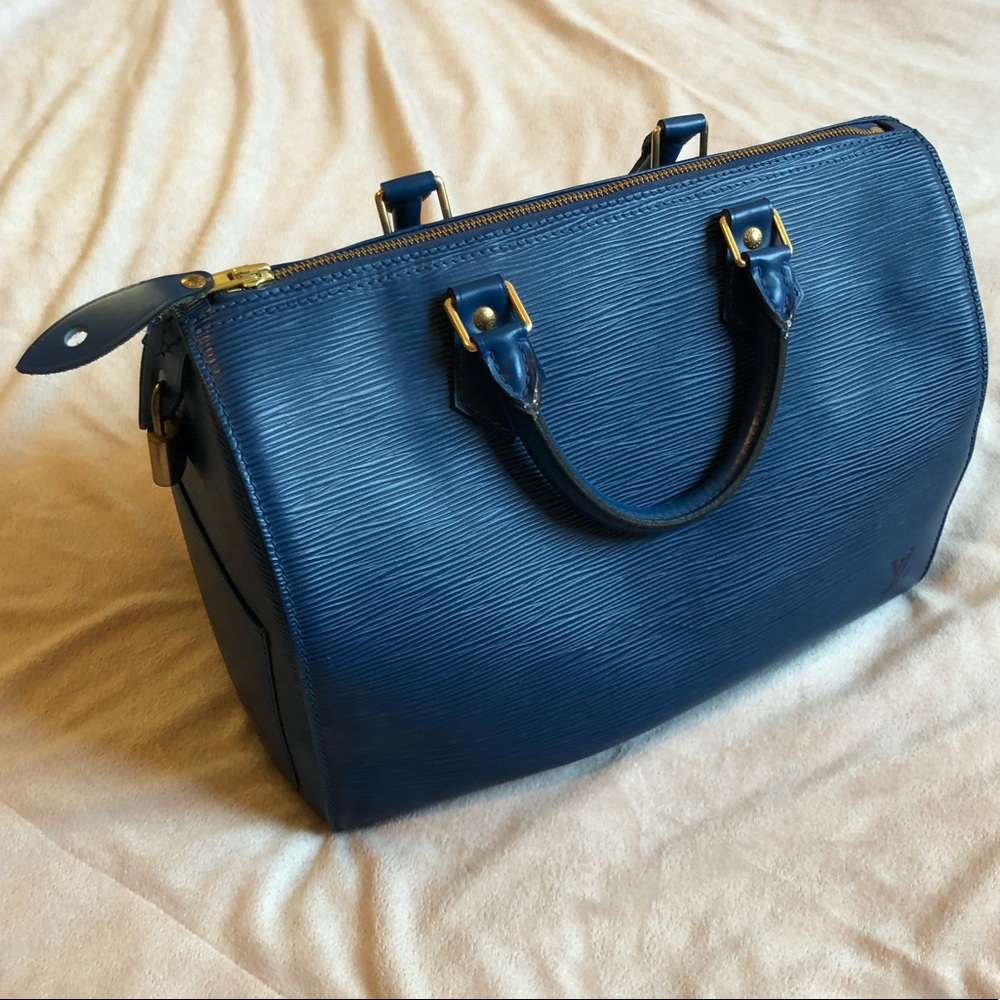 Louis Vuitton Dark Blue Tote with Gold Accents